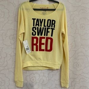 Taylor Swift  Long sleeve, sweater like material.